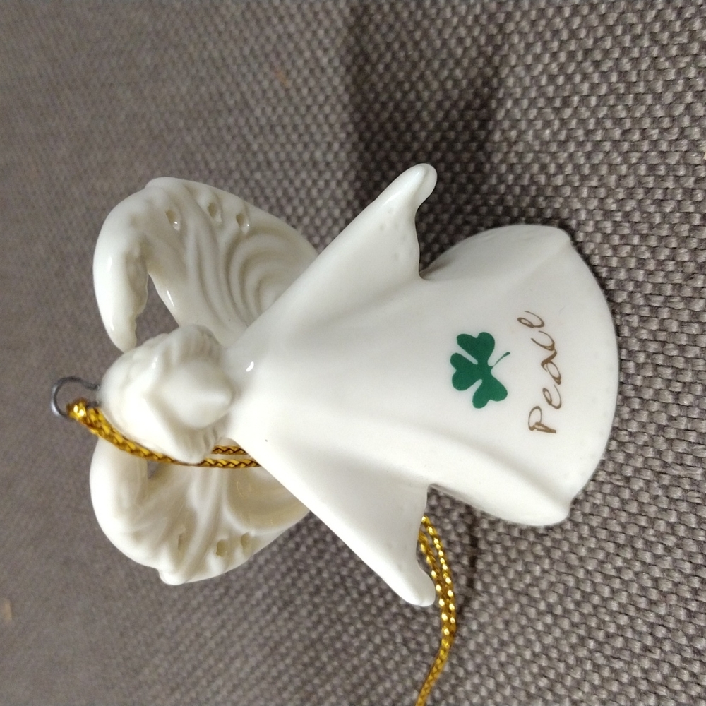 Delicate ivory angel ornament - Picture 1 of 4